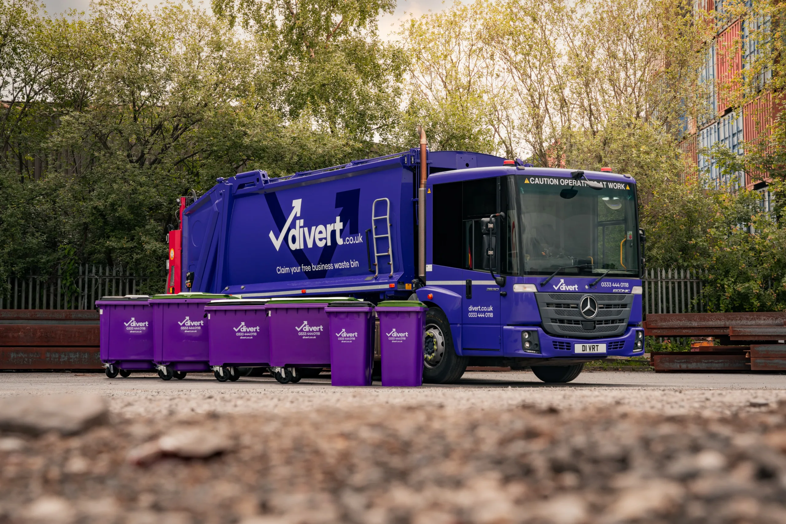 DIvert waste truck and bins.
